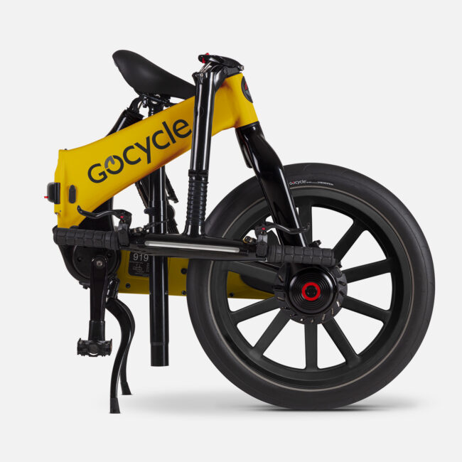 Gocycle G4i+ plegable en color amarillo, vista desde la izquierda, sobre un fondo blanco