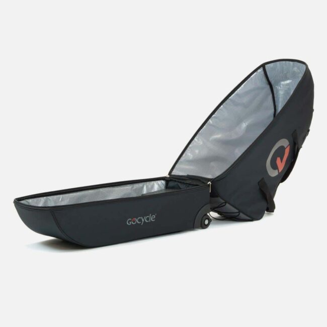 Perspectiva lateral de la maleta de viaje abierta en color gris oscuro, sin contenido en su interior, ideal para guardar y transportar la Gocycle